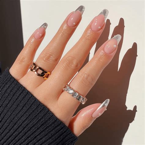 black and silver french nails|silver stiletto nails.